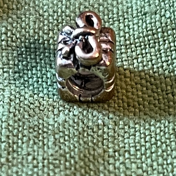 Pandora silver ribbon-wrapped gift charm. 1/4” around, 1/3” high, never worn - Picture 3 of 5